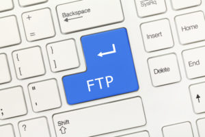 FTP 정보란? 1 Close-up view on white conceptual keyboard - FTP (blue key)